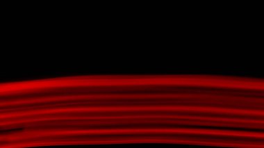 Siyah arkaplanda kırmızı ışık çizgileri