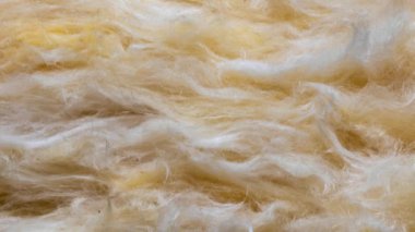 Görünür desenli sarı mineral yünü.