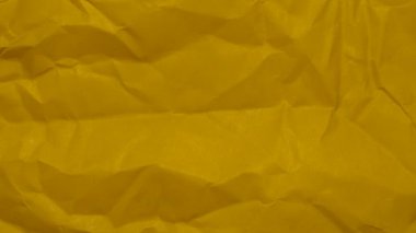 Görünür dokusu olan sarı bir kağıt. arkaplan