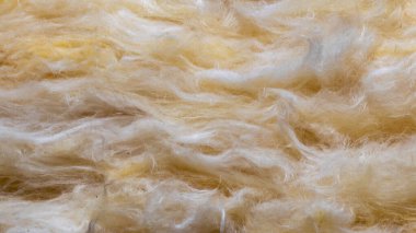 Görünür desenli sarı mineral yünü.