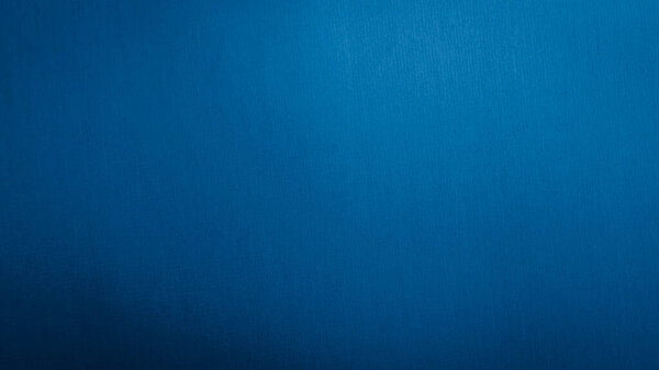 scratched blue metal sheet with visible texture. background