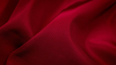 Kırmızı kırışık kumaş ve görünür detaylar. arkaplan