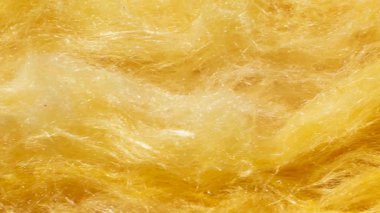 Görünür desenli sarı mineral yünü.