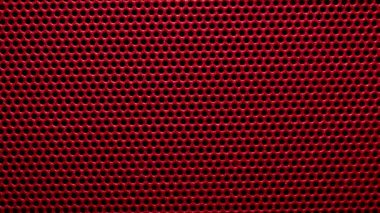 Kırmızı metal bir şebekeye yakın çekim. doku veya arkaplan