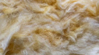 Görünür desenli sarı mineral yünü.