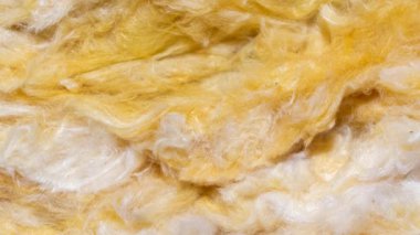 Görünür desenli sarı mineral yünü.