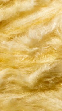 Görünür desenli sarı mineral yünü.