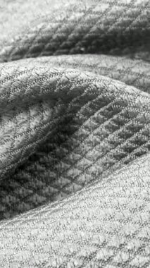 İlginç desenli gri pamuk kumaş.