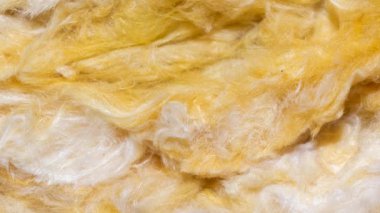 Görünür desenli sarı mineral yünü.