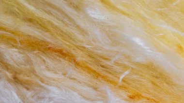 Görünür desenli sarı mineral yünü.