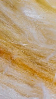 Görünür desenli sarı mineral yünü.