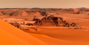 Sahra Çölü 'ndeki kum tepeleri ve kayalar, Tadrart ve Tassili n' Ajjer dağlarındaki Cezayir bölgesi, Afrika