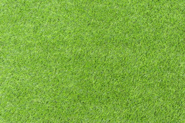 人工的な緑の芝生の床の詳細とテクスチャの背景または背景 — ストック写真