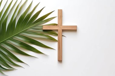 Paskalya gününden önce Kudüs 'e gelen İsa Kralı karşılamak için Palm Sunday ve Paskalya günü. Beyaz arka planda el ele tutuşmak paskalya işareti kavramı, Dünya Çevre Günü Yeşil Hindistan cevizi yaprakları