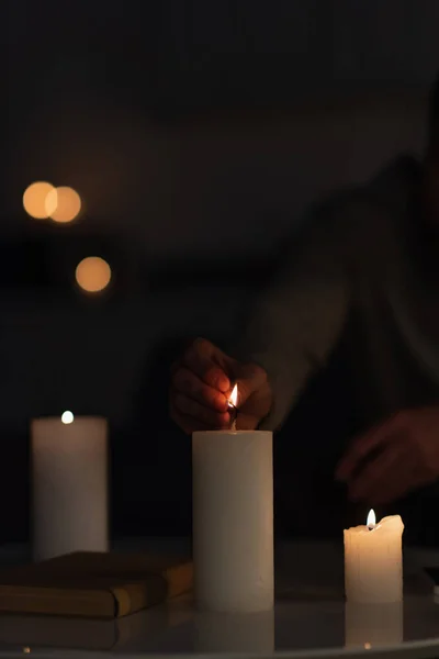 Cropped View Man Lighting Candles Darkness Caused Electricity Shutdown — Stock Photo, Image