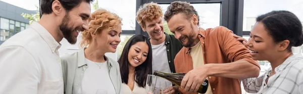 Cheerful Businessman Pouring Champagne Smiling Interracial Colleagues Having Corporate Party — Stock Photo, Image