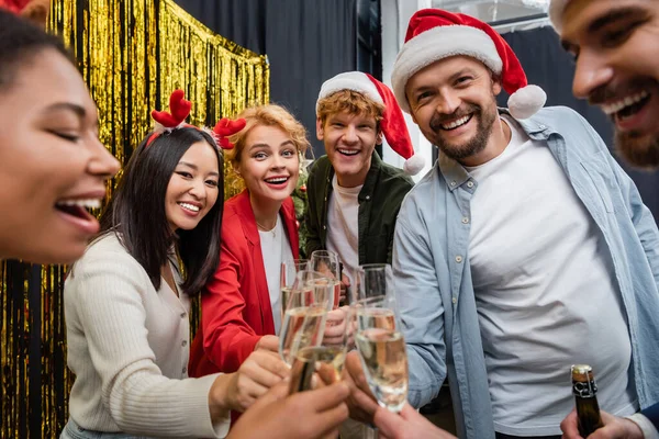 Positive Multicultural Business People Santa Hats Clinking Champagne Looking Camera — Stock Photo, Image