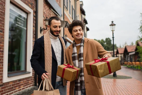 Happy Gay Man Holding Gift Boxes Bearded Boyfriend Shopping Bags — Stock Photo, Image
