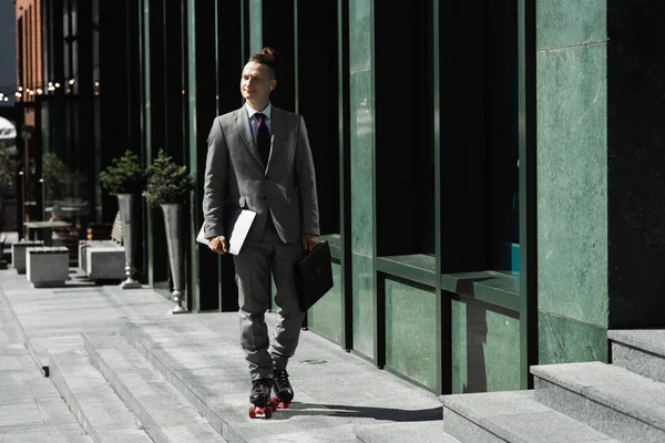 Happy Man Business Suit Roller Skates Holding Laptop Briefcase While — Stock Photo, Image