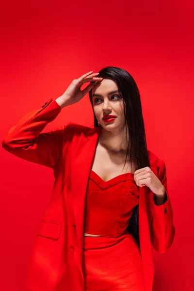 Stylish Brunette Woman Jacket Posing Looking Away Isolated Red — Stock Photo, Image