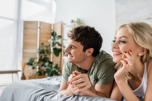 Happy Man Pajama Holding Hand Blonde Girlfriend Bed Morning — Stock Photo, Image