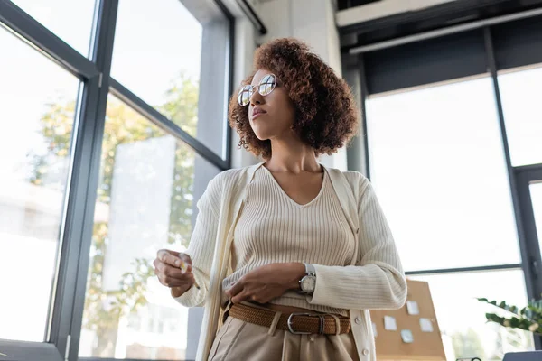 stock image Low angle view of young african american businesswoman with diabetes doing insulin injection 