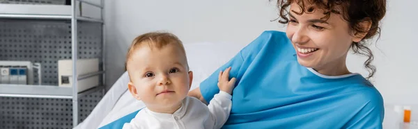 Joyful Woman Patient Gown Looking Baby Girl Hospital Ward Banner — Stock Fotó