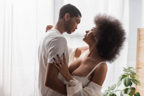 Side View African American Couple Lovers Embracing Looking Each Other — Stockfoto