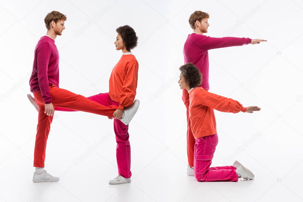 Side view of multiethnic couple in magenta color clothes showing he word with legs and hands on white background