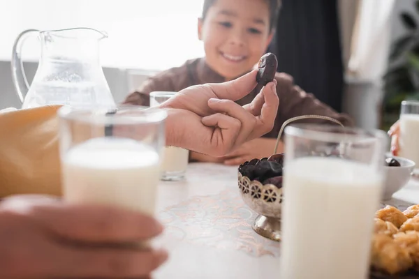 Muslim Father Holding Date Fruit Milk Blurred Son Ramadan Morning — Stockfoto