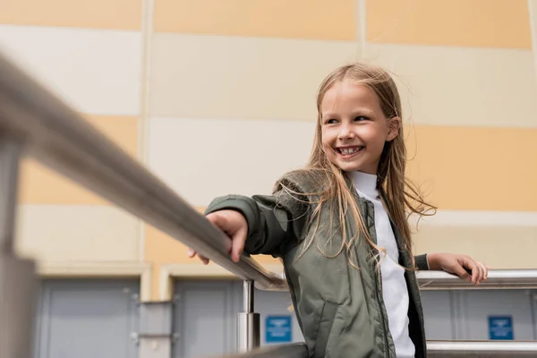 Satisfied Preteen Girl Stylish Bomber Jacket Leaning Metallic Handrails Mall — Stok fotoğraf