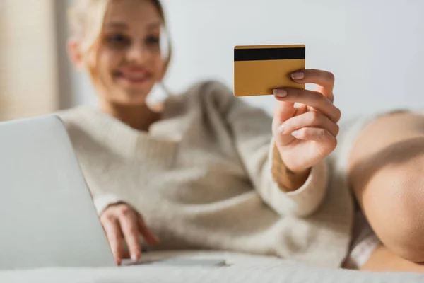 Blurred Woman Holding Credit Card Using Laptop While Doing Online — Stock Photo, Image