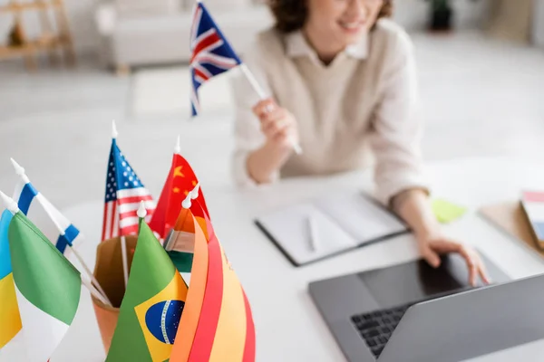 Selective Focus International Flags Teacher Foreign Languages Using Laptop Blurred — Stock Photo, Image