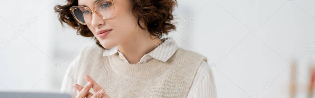 Curly teacher showing British two handed sign alphabet meaning letter f during lesson, banner
