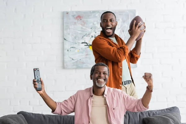 Cheerful African American Father Son Watching Rugby Match Home — Stock Photo, Image