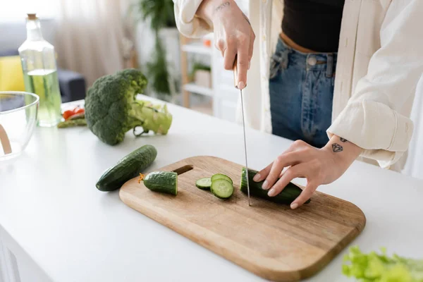 Cropped View Young Woman Cutting Fresh Cucumber Kitchen — Stock Photo, Image