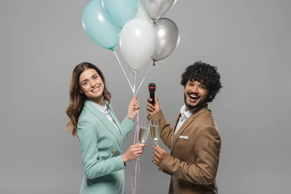 Carefree Multiethnic Event Hosts Formal Wear Holding Festive Balloons Microphone — Stock Photo, Image