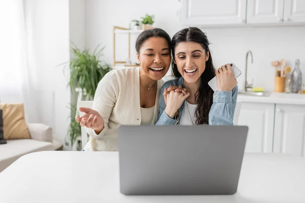 Happy Interracial Lgbt Couple Holding Hands Smiling Video Call — Stock Photo, Image