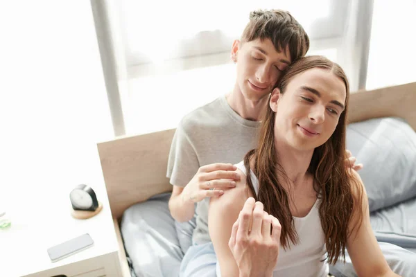 Young Homosexual Man Closed Eyes Touching Shoulders Smiling Long Haired — Stock Photo, Image