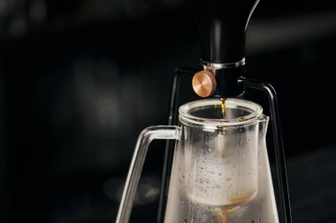 coffee shop, siphon coffee maker with freshly brewed espresso dripping in glass coffee pot clipart
