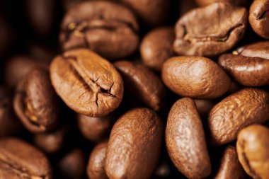close up, brown coffee beans in wooden box, medium roast, caffeine and energy, coffee background  clipart