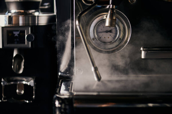 coffee shop, professional espresso machine and steamer with temperature scale, barista equipment 