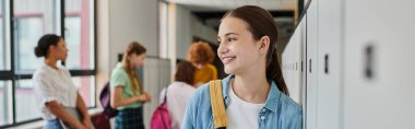 banner, happy teenage girl smiling in school hallway, cultural diversity, teacher and kids, blur clipart