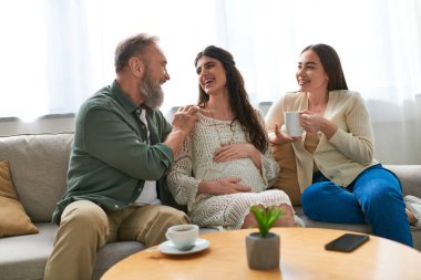 father paid visit to his pregnant daughter and her partner, in vitro fertilization concept clipart