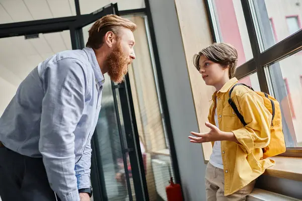 Man Stands Little Boy Front Window Engaging Thoughtful Conversation While — Stockfoto