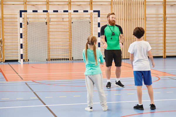 A man teacher instructs a group of kids standing in gym, united in learning and growth.