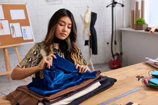 Young Asian Clothes Designer Checking Quality Fabrics Samples Work Desk — Stock Photo, Image