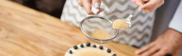 stock image female student with nail polish decorating cake next to chef while on cooking lesson, banner