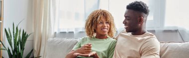 cozy conversation of happy african american couple using sign language for communication, banner clipart