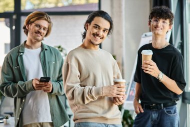 men in their 20s with coffee in a friendly office atmosphere, professional headshot and startup clipart